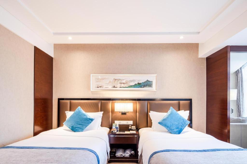 เฉิงตู ไรส์ซิง บัตเตอร์ฟลาย โฮเต็ล Hotel ภายนอก รูปภาพ