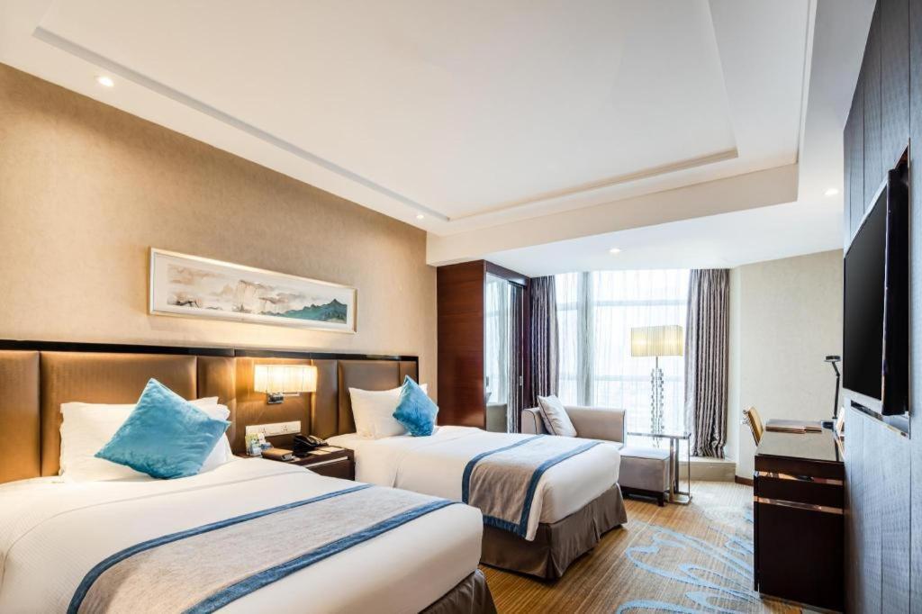 เฉิงตู ไรส์ซิง บัตเตอร์ฟลาย โฮเต็ล Hotel ภายนอก รูปภาพ